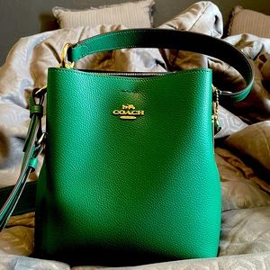 Green coach bucket purse Bnwt